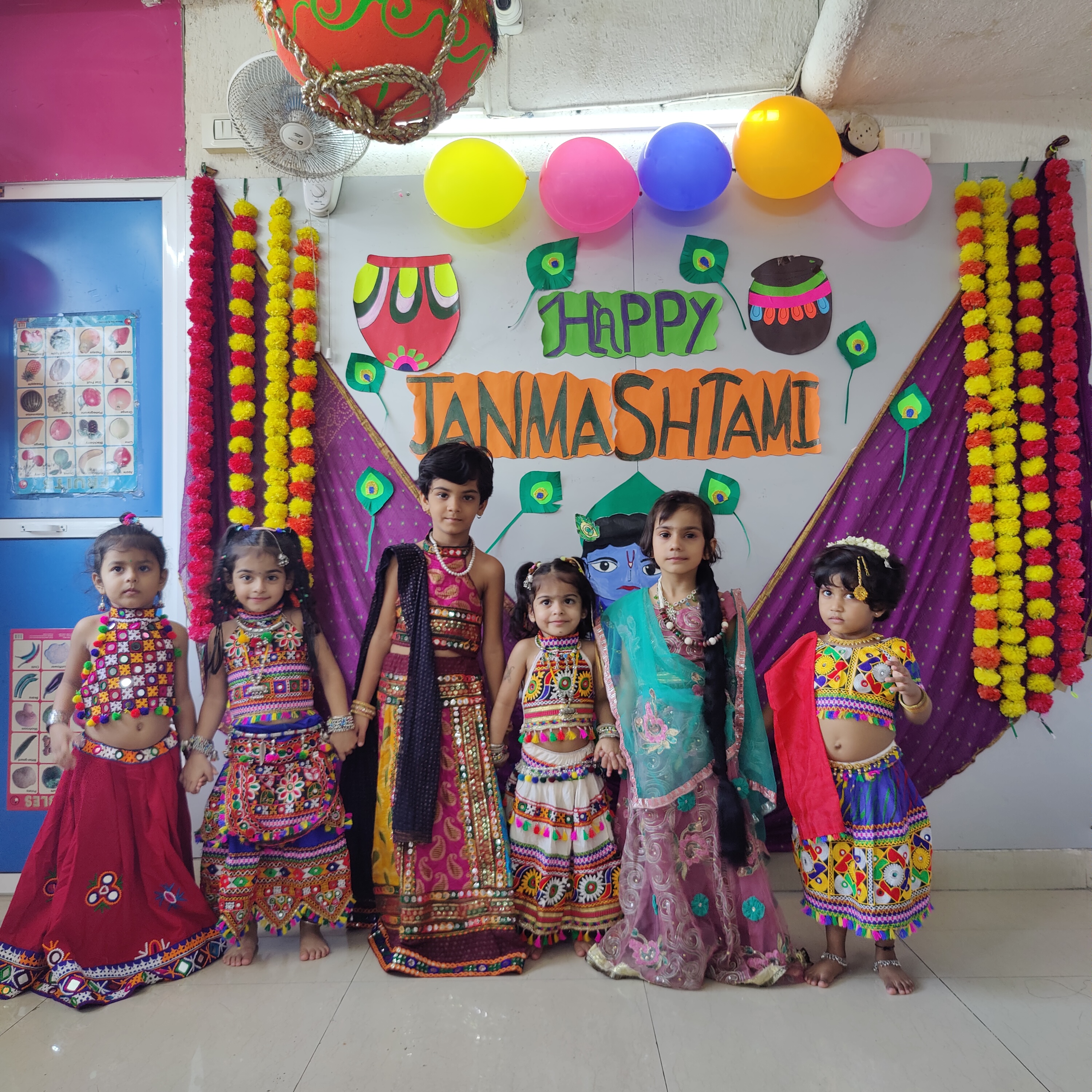 Colorful Janmashtami event with kids performing on stage