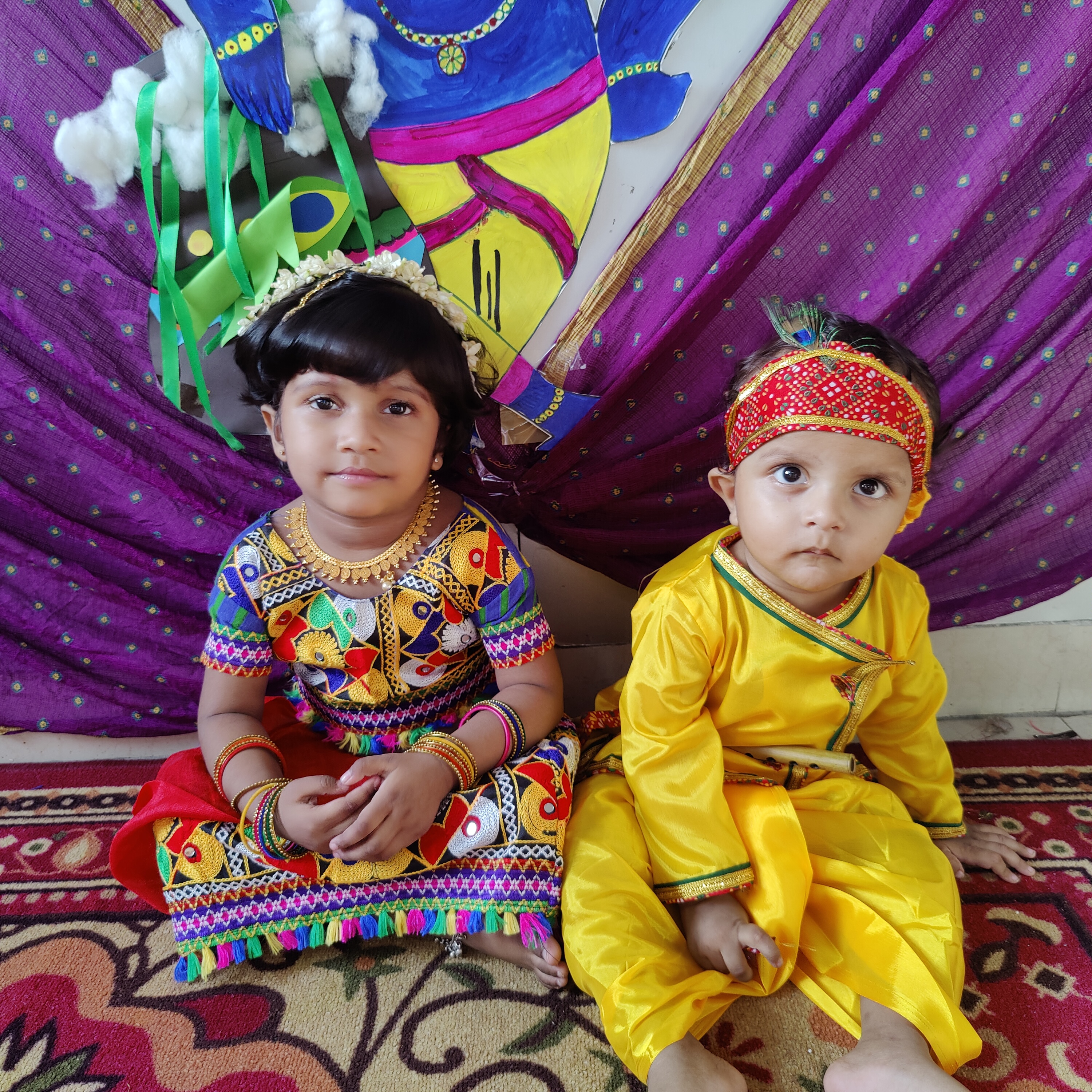 Kids dressed as Lord Krishna and Radha during Janmashtami celebration