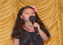 Playgroup kid performaing on stage