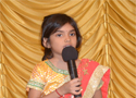 Playgroup kid singing on stage